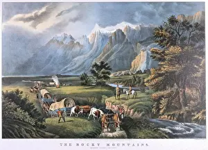 Wagons: The Rocky Mountains. Emigrants in covered wagons