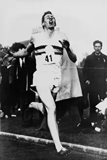 Achieving: Roger Bannister crossing the finish line ?