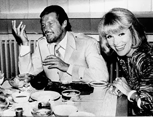 Kessler: Roger Moore, actor, with Ellen Kessler, Munich