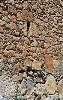 Castro: Roman remains in the facade of a house. Spain