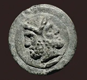 Janus: Roman as with a representation of the god Janus