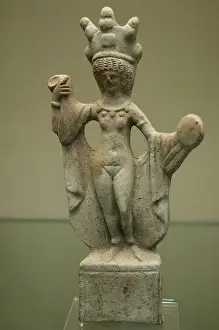 Aphrodite: Roman statuette of Venus holding a mirror. 2nd century AD