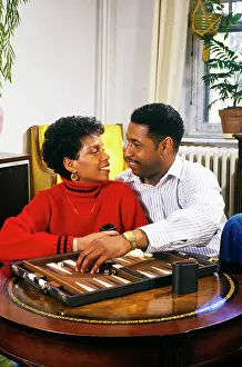 Backgammon: Romantic African-American Couple Playing Backgammon