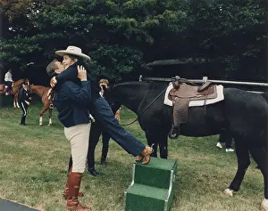 Equestrians: Ronald Reagan affectionately assists First ?