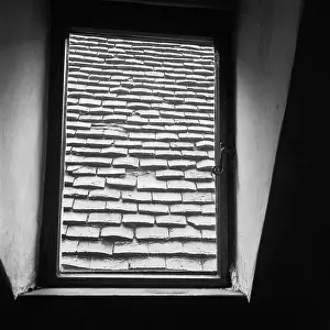 Gradient: Roof tiles through window