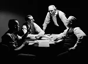 Businesspeople: Back room conference with men businessmen and