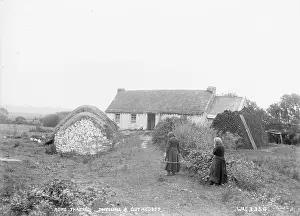 Dwelling: Rope Thatched Dwelling and Outhouses