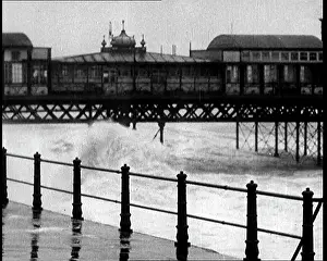 Crashing: Rough Seas Crashing Around a Seaside Pier