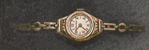 Numerals: Round Copper Watch
