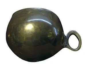 Insides: Round golden jug with a handle (1000-1500 BF)