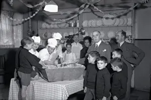 Mixture: Royal Albert Orphanage, Bagshot, Surrey - cooking in kitchen