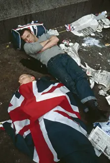 Littered: Royal Wedding -- men asleep on pavement