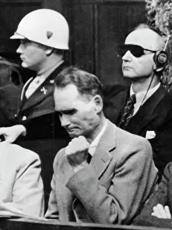 Clenching: Rudolf Hess in the defendants box at the Nuremberg Trials