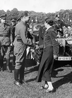 Reichsleiter: Rudolf Hess is given flowers at his arrival, 1935