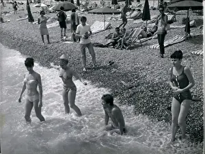 Nureyev: Rudolf Nureyev on beach with other dancers, Nice