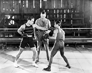 Dempsey: Rudolph Valentino at a boxing lesson