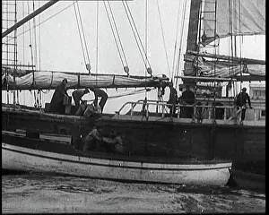 Runners: Rum Runners on a Boat Offloading Their Cargo