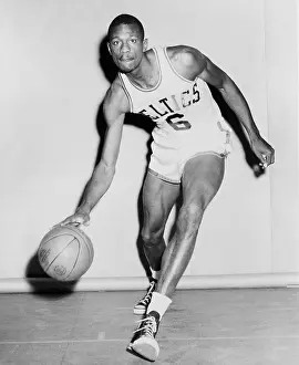 Dribbling: Bill Russell in his Boston Celtics uniform ?