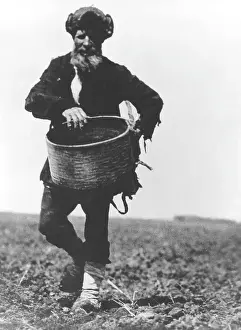 Hatted: Russian Farmer Tending to his Land