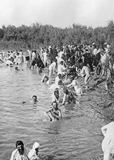 Pilgrims: Russian pilgrims bathing in the Jordan, 1908