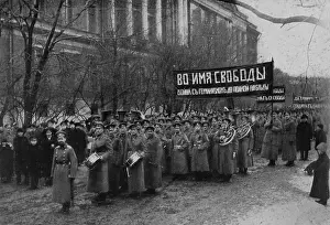 Translates: Russian Revolutionary troops demonstrate in front
