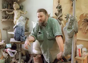 Displayed: Russian sculptor Dmitry Tugarinov at work, 1998