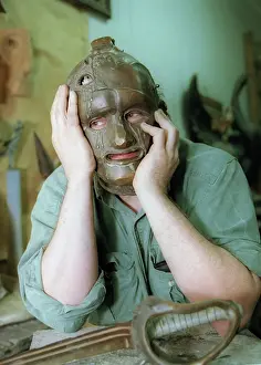 Displayed: Russian sculptor Dmitry Tugarinov at work, 1998
