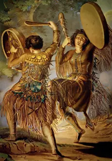 Treating: Russian shaman performing ritual dance while playing drums