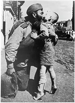 Embraces: RUSSIAN SOLDIER RETURNS
