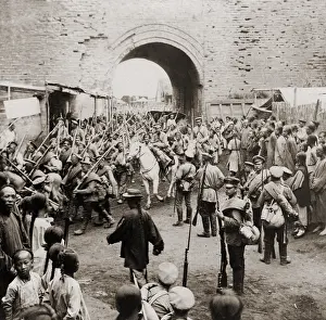Mukden: Russian soldiers passing through the gates of Mukden