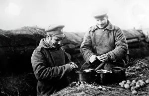 Foods: Russian soldiers peeling potatoes