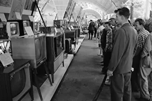 Sokolniki: Russians looking at television sets at the ?