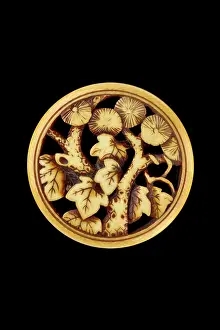 Ingram: Ryusa-style netsuke with pine tree and vine leaves