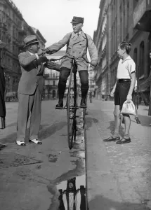 Farthing: SA-man on a penny farthing in Berlin, 1933