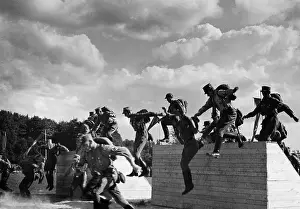 Hurdle: SA members during steeplechase, undated