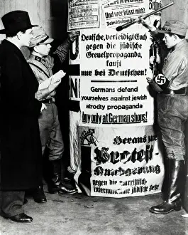 Pasting: The SA paste posters to a Litfasssaule advertising column