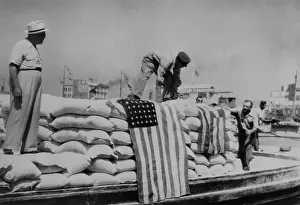 Rightist: Sacks of flour, the first relief supplies from