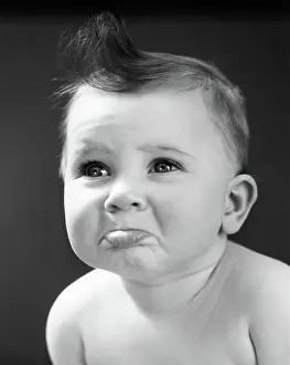 Pout: Sad Baby with Pouting Lower Lip Extended About to Cry