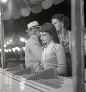 Fringe: Sad-looking girl at the fair
