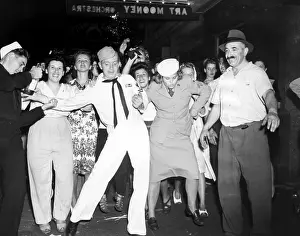 Jitterbug: A sailor and his girlfriend doing the jitterbug ?