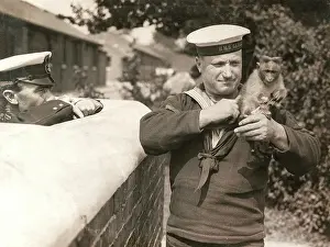 Mascot: Sailor of HMS Ganges with monkey mascot, WW1
