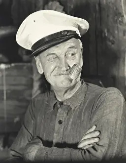 Wink: Sailor smoking corn pipe