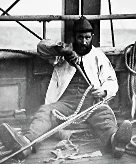 The Keasbury-gordon Photograph Archive Collection: Sailor spanning on whaler from Dundee in Greenland