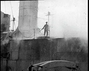 Spraying: Sailor Spraying Hose On Deck Of Warship