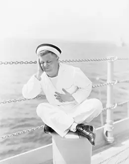 20 25: Sailor suffering from stomach ache on the ship