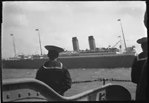 Southsea: A sailor watches a passing ship