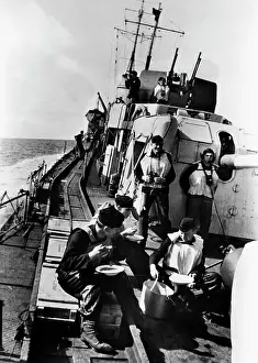 Cutter: Sailors on board a minelayer, 1943