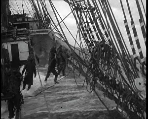 Washed: Sailors Hanging On To the Rigging of a Large