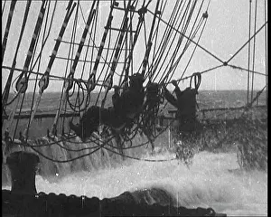 Washed: Sailors Hanging On To the Rigging of a Large