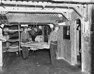 Removing: Sailors stripping ship aboard USS Ranger in